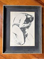 Full view of framed ink wash drawing showing two nude male figures embracing, signed by artist J Rosenthal.