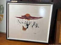 Front view of framed mixed media artwork 'Unicorn Tree' by Paul Goff, showing full composition including trees, abstract shapes and animal figure.