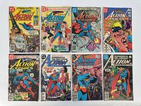 Top-down view of 8 Action Comics featuring Superman with colorful covers, arranged in two rows.