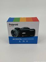 Photo of the Polaroid camcorder original box showing front side with 4K digital camcorder image and branding.