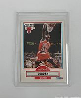 Front of the Michael Jordan 1990 Fleer basketball card showing action dunk photo and Chicago Bulls logo.