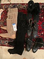 Overhead view of all five pairs arranged on rug