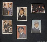 Photo of front sides of six 1964 Topps Beatles Diary trading cards showing individual band member portraits and one group photo.