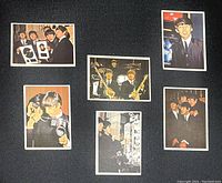 Front side of six vintage Beatles Diary trading cards showing color photos of The Beatles in various scenes and moments.
