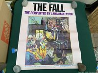 Full view of vintage 'The Fall The Perverted By Language Tour' poster with colorful cubist abstract human figures and text, showing good overall condition with some creases.