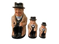 Front view of the three Winston Churchill character jugs in descending size order