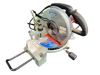 Side angled shot of one King Canada compound mitre saw showing the handle, blade guard, and metal base with angle markings and adjustments.