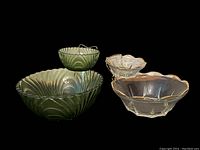 Green and clear Anchor Hocking chip and dip bowl sets shown stacked with smaller bowls inside larger bowls.