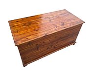 Top angled view of the cedar blanket box showing wood grain and rectangular shape.