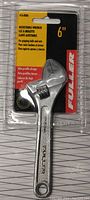 Front view of the Fuller 6-inch adjustable wrench in original sealed packaging showing product name and size.