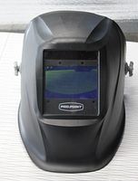 Front view of the Pro-Point auto-darkening welding helmet showing the viewing window and the brand logo below it.