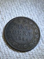 Another close-up photo of the same coin showing consistent details and condition from a slightly different angle.