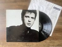 Vinyl LP album Peter Gabriel So with original inner sleeve partially visible. Album cover shows a black and white portrait of Peter Gabriel.
