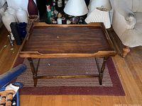 Full view of the wood tray top table with removable tray, showing the tray on the stand with turned legs.