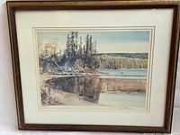 Front view of the framed limited edition print showing the bay landscape with trees and water reflections at dusk.