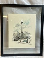 Full view of the framed vintage print showing the entire artwork and black frame.