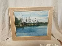Full frontal view of the framed oil painting showing the lake scene and surrounding trees.