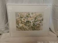 Full frontal image of framed floral watercolour painting.