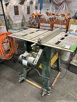 Full view of saw with stand and fence
