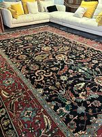 Full carpet displayed in room with sectional sofa