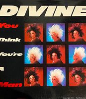 Album cover with title 'You Think You're a Man' and nine colorful portraits of Divine's face on a black background.