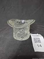 Front view of vintage glass top hat toothpick holder showing Daisy & Button pattern and shape