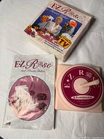 Photo showing the E-Z Rose flower maker device, instruction booklet, and original box.
