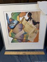 Full view of the framed art print titled "I Am Unique" showing the mixed media collage artwork including abstract human forms, butterfly with eye, and text.