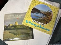 Two Welsh choir LP vinyl records shown side by side, featuring scenic Welsh landscapes on the covers.