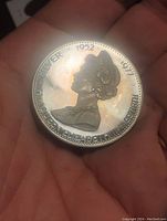 Obverse of coin showing Queen Elizabeth II profile portrait and inscriptions