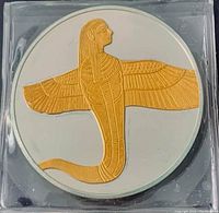 Front side of the coin showing the human-headed winged cobra design in gold on silver background.