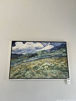 Full view of the framed canvas wall art depicting Van Gogh style landscape with swirling clouds and fields