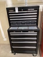 Top and bottom units combined to show full tool chest with Craftsman branding and multiple drawers.