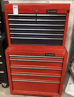 Front view of stacked two-piece chest showing all drawers and Husky logo