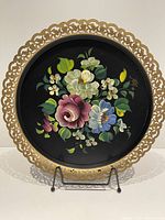 Front view of large Nasco tray showing floral painted center with gold scalloped edge