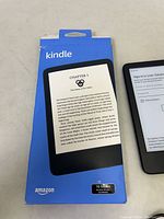 Amazon Kindle retail box showing 16 GB storage and Kindle branding