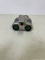 Front view of the Spy Night Scope showing two optical lenses.