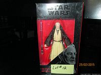 Front view of the sealed Obi-Wan Kenobi Star Wars Black Series action figure packaging, showing figure and lightsaber inside clear window.