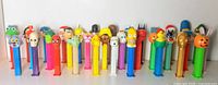 Group shot of all 34 PEZ dispensers standing in rows
