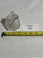 Side view with measuring tape showing approximate size of mustard pot at about 3 inches wide.