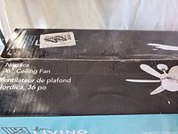 Photo of the unopened box of Nordica 36 inch ceiling fan showing brand, size and product image.