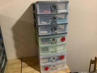 Seven-drawer plastic storage unit in mixed pastel and clear drawers