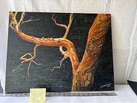 Photo of original Arbutus tree painting on canvas showing textured brush strokes and artist signature dated 2010.