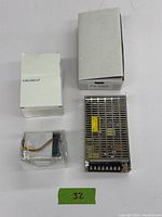 Shows both items, the power supply and the CPU cooler, along with their original boxes.