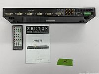 Back and top view showing multiple DVI input ports, digital audio ports, RS232 and IR control ports, and two relay control terminals on the device.