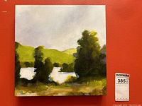 Front view showing artwork with MaxSold sticker on red background