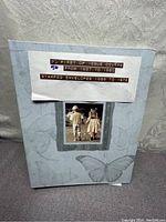 Front cover of the collection folder with title and decorative vintage photo of children and butterfly print.