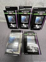 Lot of 5 Final Fantasy Type-0 Starter Sets including visible card decks and packaging.
