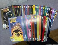 Ultimate X-Men comic books arranged by number, showing issues 1 to 39 with mostly full set.