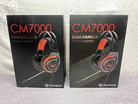 Front view of two sealed boxed VANKYO CM7000 Commander Gaming Headsets in red/black color.